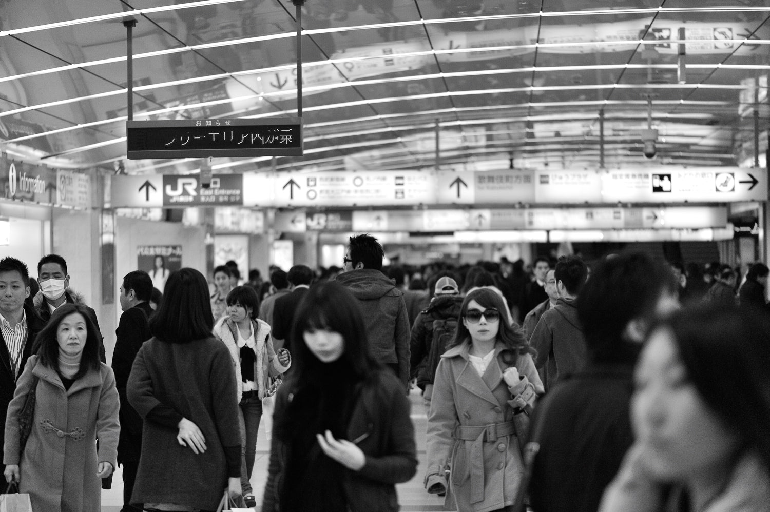 Commuters in the underground passage of Shinjuku Station.